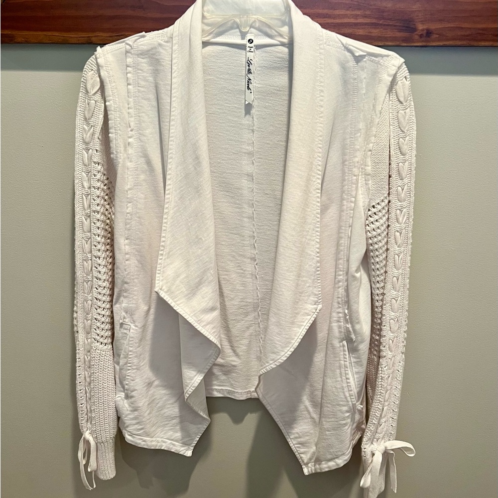 White lightweight sweater.